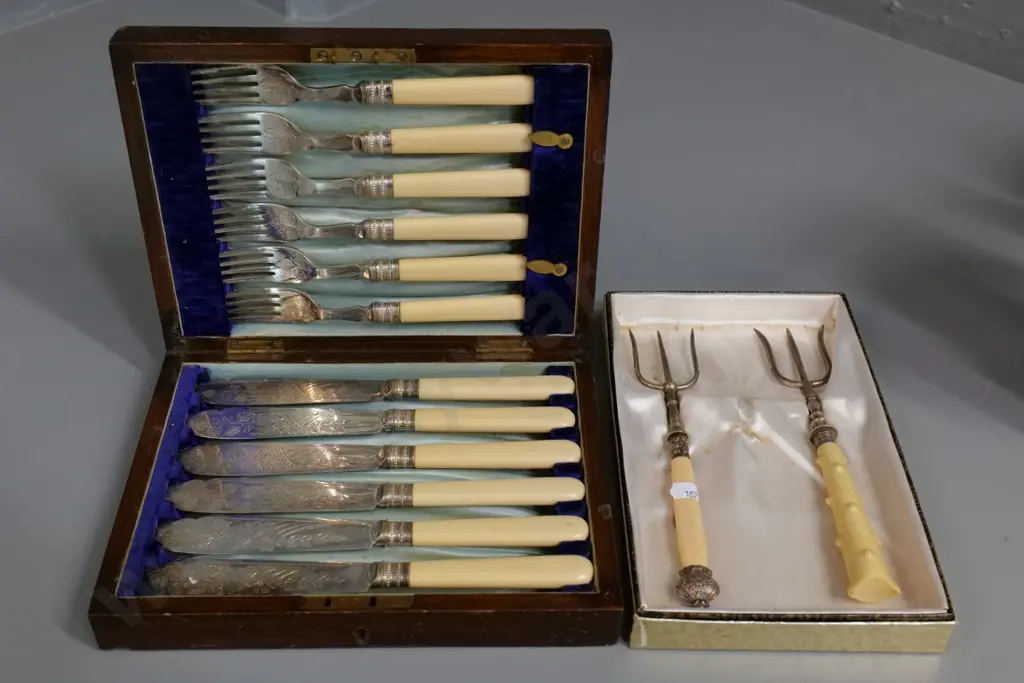 wood-cased set bone handled fish knives and forks, and 2 bone handled serving forks, one marked sterling silver Image 1++