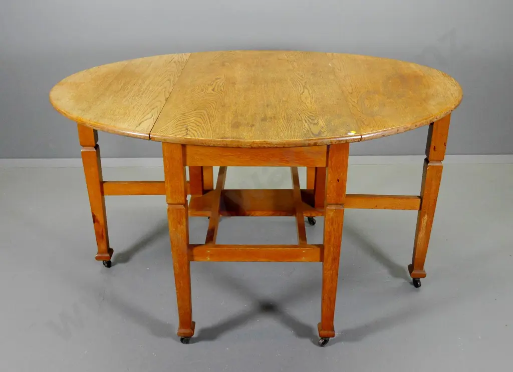 deco oak drop-side dining table on original metal casters - some marks to finish H-770 W-1000 L-1320 extended Image 1++
