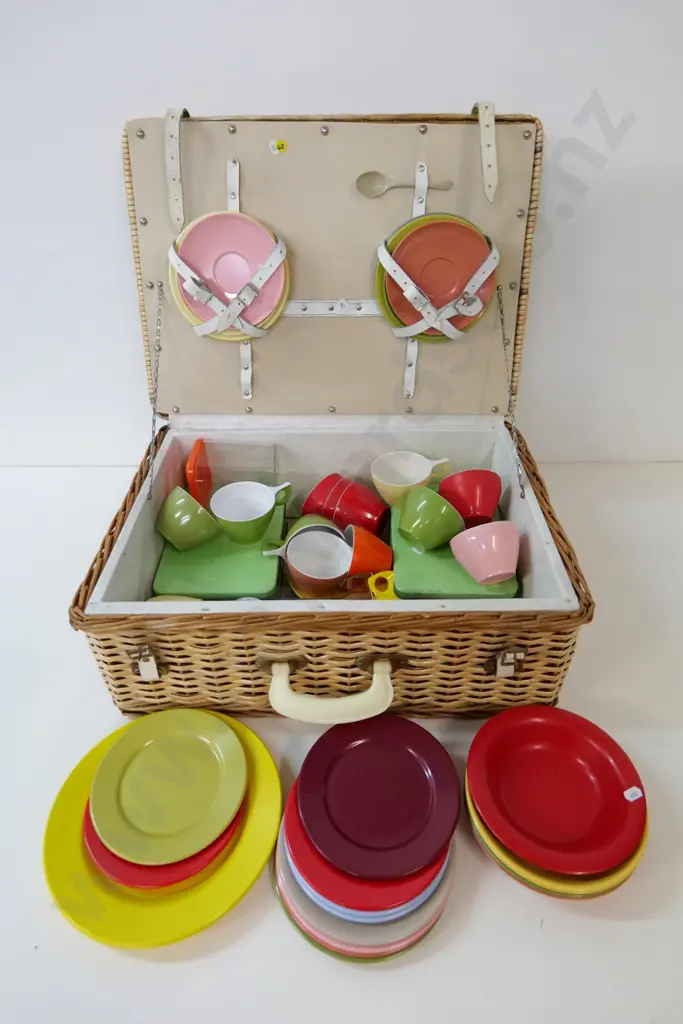 plastic cane picnic basket fitted with Falcon Duraware and other colourful cups, saucers, etc. Image 1++