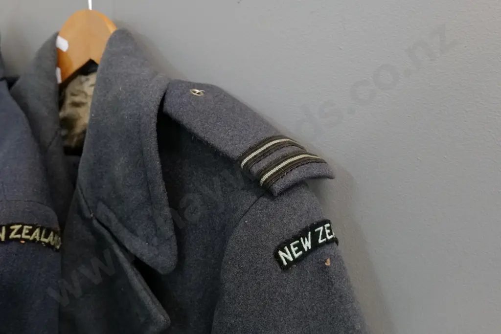 2 WWII RNZAF uniform items - jacket with belt and greatcoat, both need a clean Image 1++