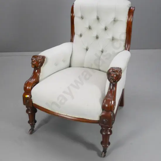 Victorian mahogany framed armchair w/deep-button back, unusual lions head arms small mark to seat. H950 W690 D770