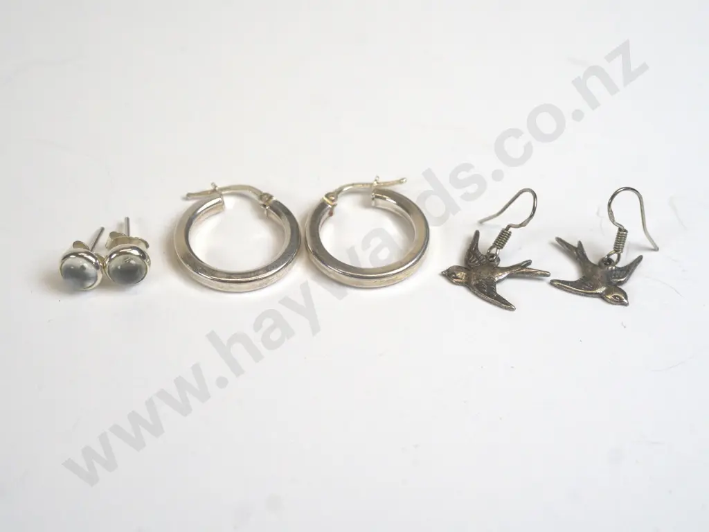 3 pairs of silver earrings stamped 925 Image 1++