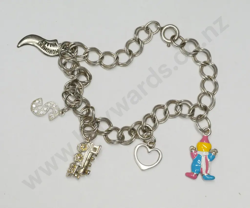 childs charm bracelet with 5 charms stamped 925 Image 1++