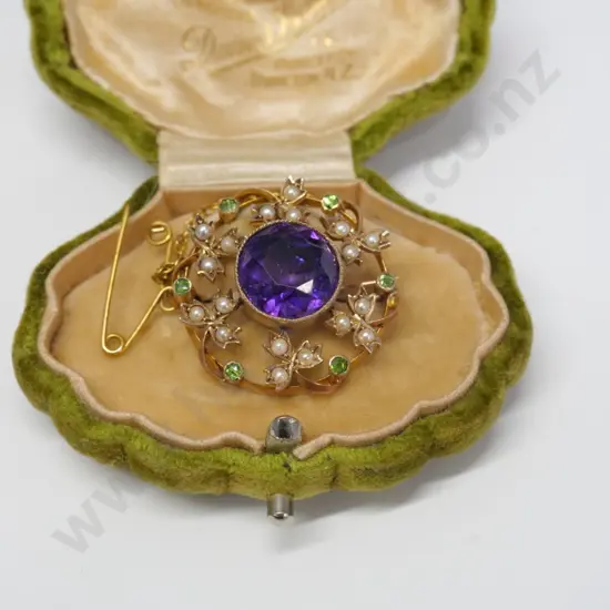 amethyst & seed pearl brooch with safety chain in green velvet shell box