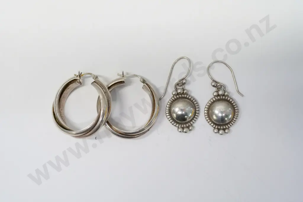 pair of silver hoop earrings stamped 925 & pair of silver drop earrings stamped sterling Image 1++
