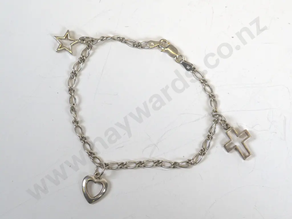 silver charm bracelet with cross, star heart charms stamped 925 Image 1++