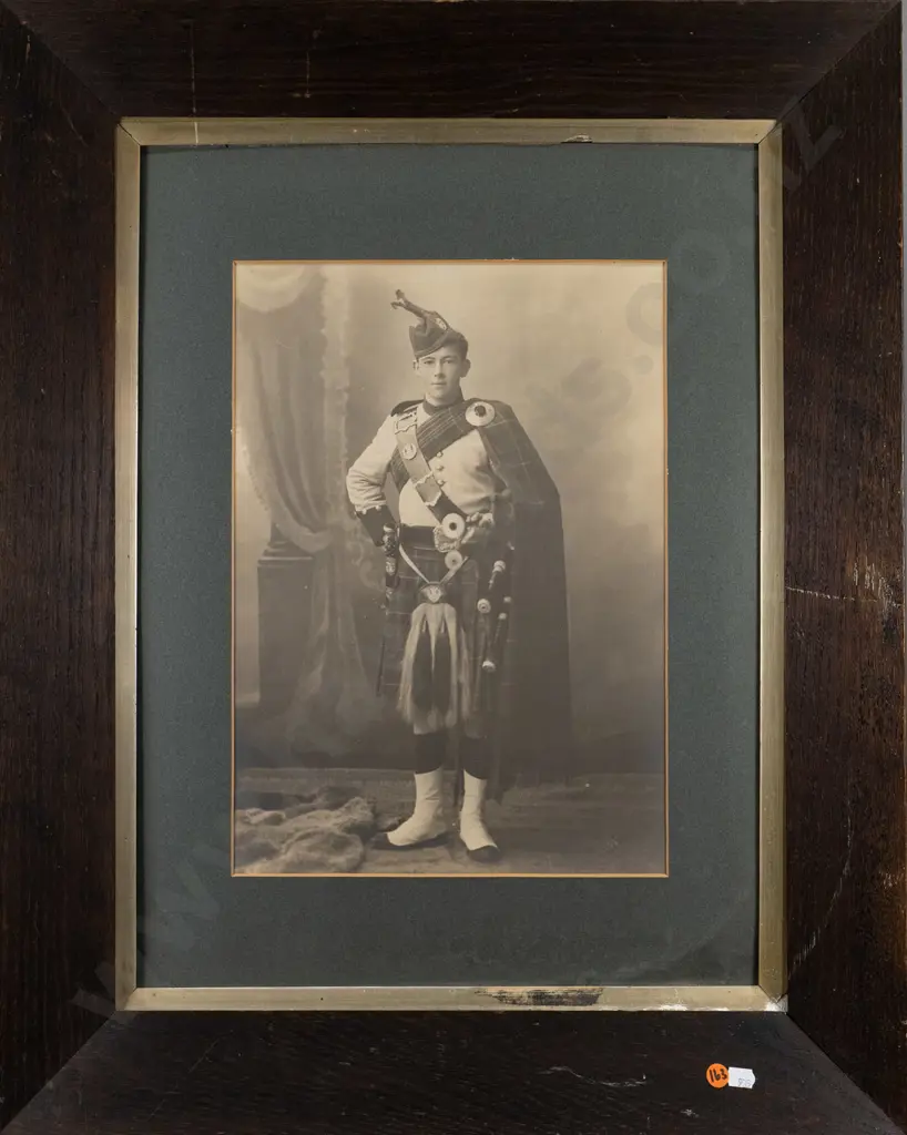 framed vintage black and white photograph - portrait of a bagpiper (slight aging) H-390 W-270 Image 1++