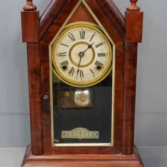 vintage wood-cased Ansonia mantel clock with key H-510 W-300