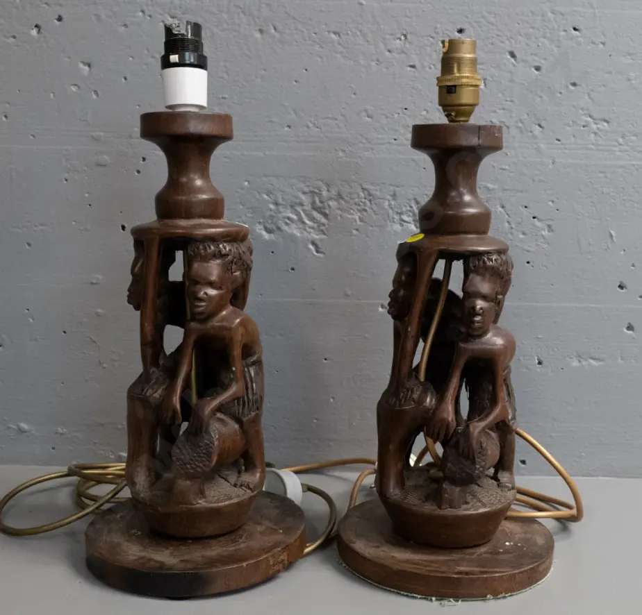 pair of carved hardwood table lamps with ethnic designs H-400, split to timber of one, other needs rewiring Image 1++