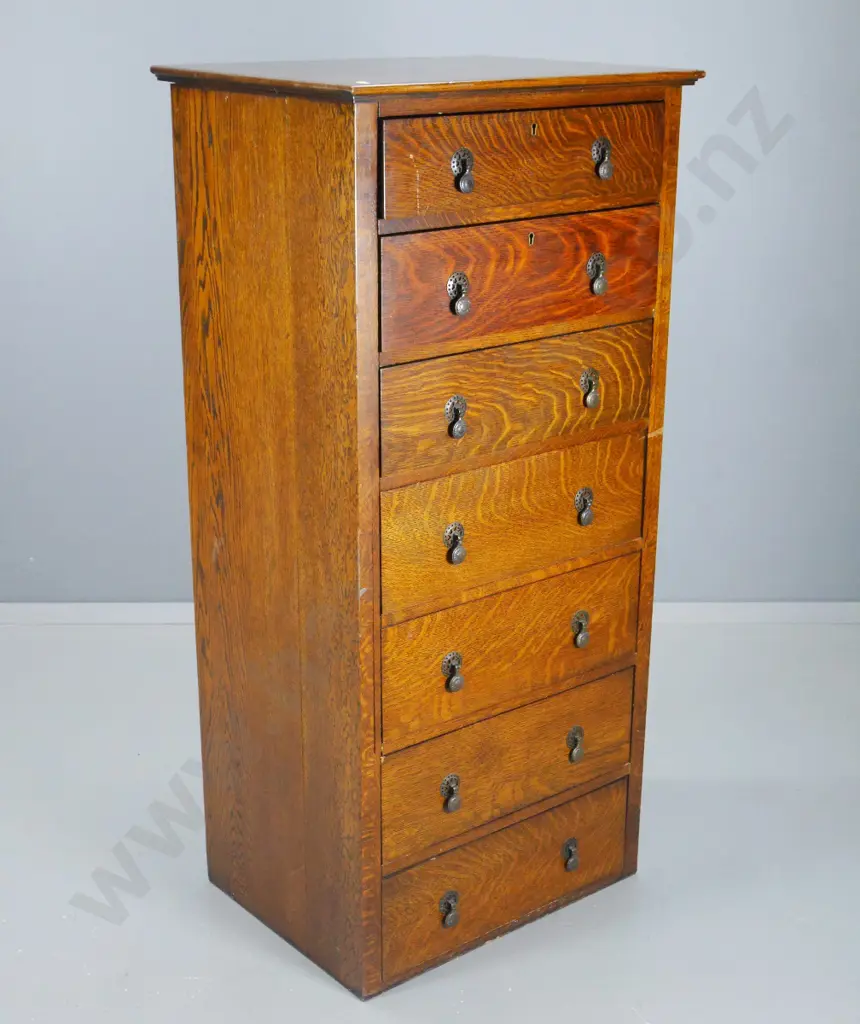 deco oak 7-drawer chest with original drop handles, some splitting and marks H-1280 W-610 D-480 Image 1++