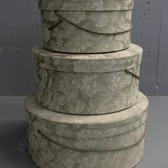 nesting set of 3 hat boxes covered in floral brocade fabric with corded handles - largest is H-170 Diameter 390