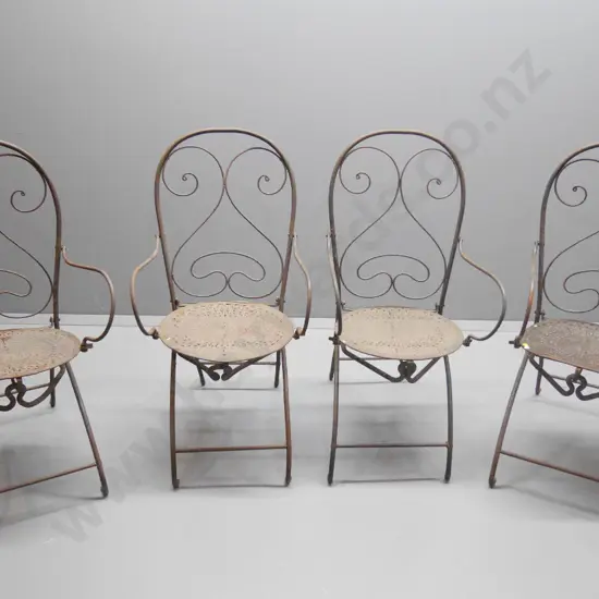 4 wrought iron French style collapsible cafe chairs w/stamped seats, one w/damage to arm bracket H1030 W520 D520