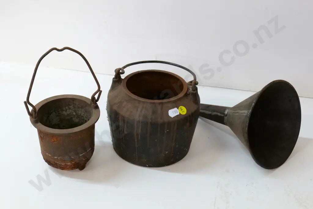 vintage cast iron glue pot H-240 with handle up, and a tin funnel Image 1++