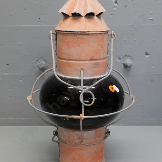metal and glass Dutch lock lantern, has mend to red glass insert. 410 Diameter 240
