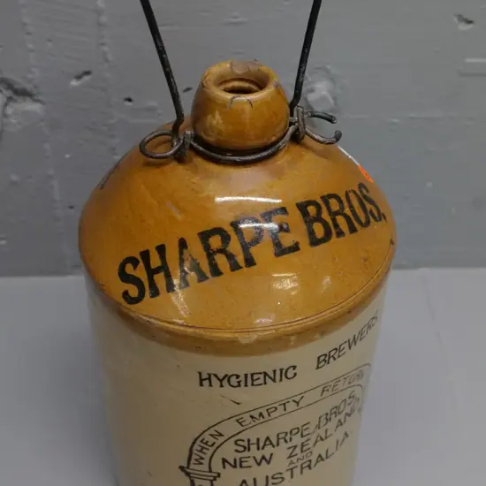Sharp Brothers NZ & Australia narrow mouth stoneware crock with wire handle, some chips to rim H-360