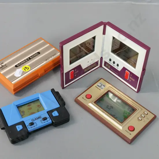 4 retro handheld electronic arcade games - Nintendo Donkey Kong, Mario Brothers, and Parachute plus one other