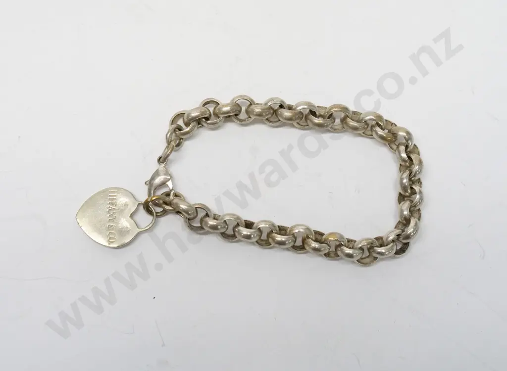 silver chain link bracelet with a heart stamped return toTiffany & Co New York 925 Image 1++