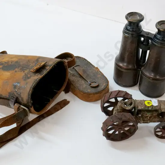 restorer's toy tractor with metal wheels, driver has lost his head, & vintage binoculars in worn leather case