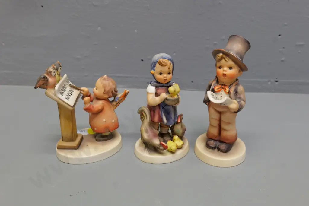 3 Goebels Hummel figurines - boy singer H-130, angel musician, girl with chickens Image 1++