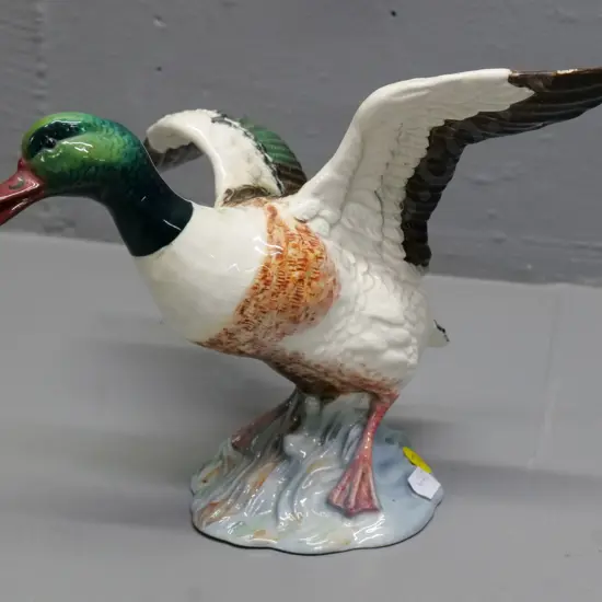 Beswick duck taking to flight - impressed on base No. 995 H-160 L-230