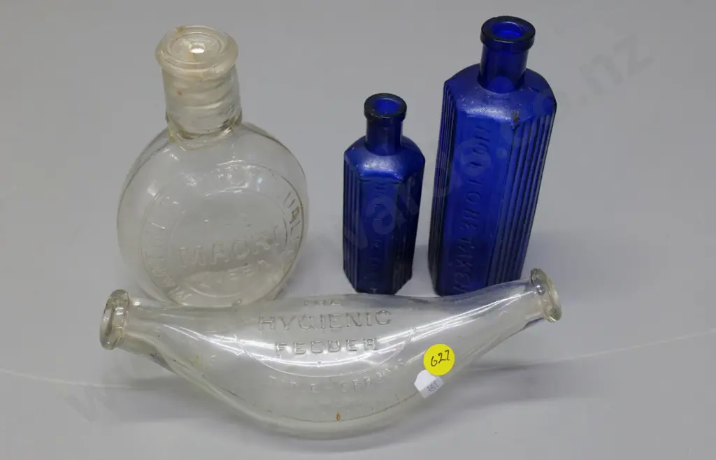 4 bottles - Martin's 'The Maori Queen' made in France (crack to mouth) 2 blue "Not To Be Taken" & English feeding bottle Image 1++