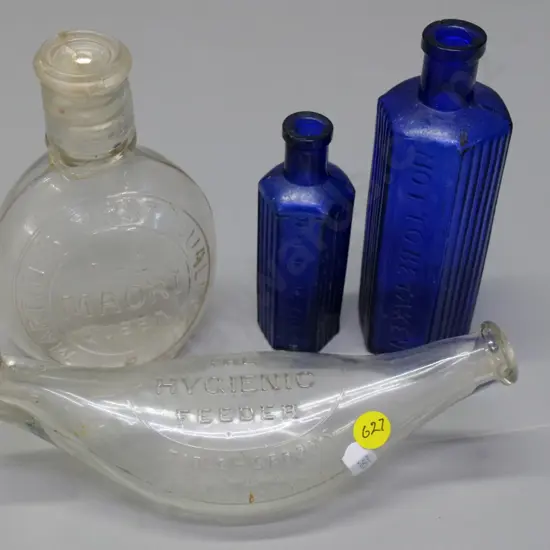 4 bottles - Martin's 'The Maori Queen' made in France (crack to mouth) 2 blue "Not To Be Taken" & English feeding bottle