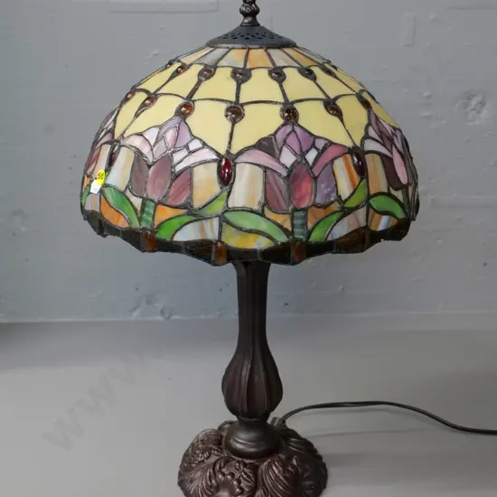 reproduction Tiffany style table lamp with composite base, floral motif glass shadeH-520