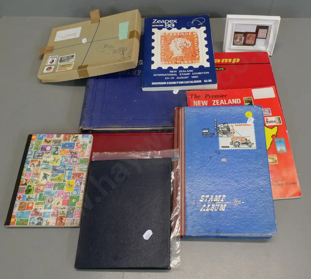 assorted stamp albums including New Zealand mint, framed Victorian New Zealand, Zeapex 80 anniversary set, etc. Image 1++
