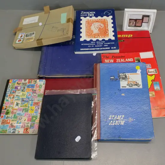assorted stamp albums including New Zealand mint, framed Victorian New Zealand, Zeapex 80 anniversary set, etc.