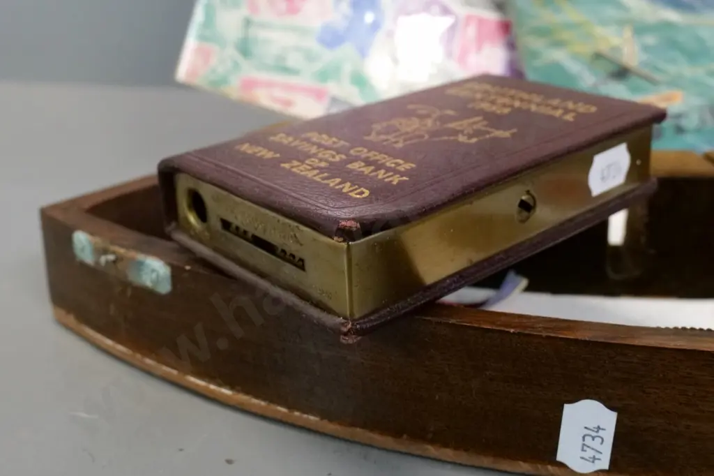 1956 Southland Centennial post office money box (bent) 2 stamp albums, badges, etc. w/ wooden cutlery case Image 1++