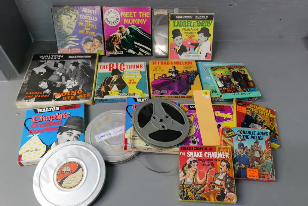 18 retro 8mm film reels - Charlie Chaplin, laurel & Hardy, Abbott & Costello, etc. Image 1++