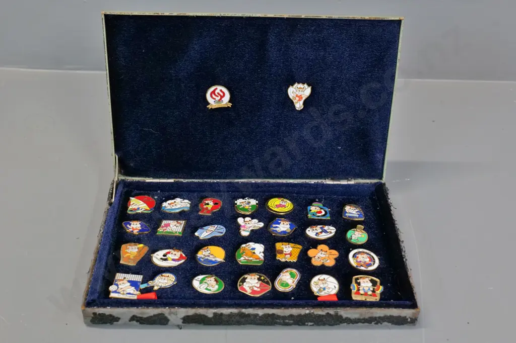cased collection of 1997 National Games of China enamel badges - paint flaking from metal case Image 1++