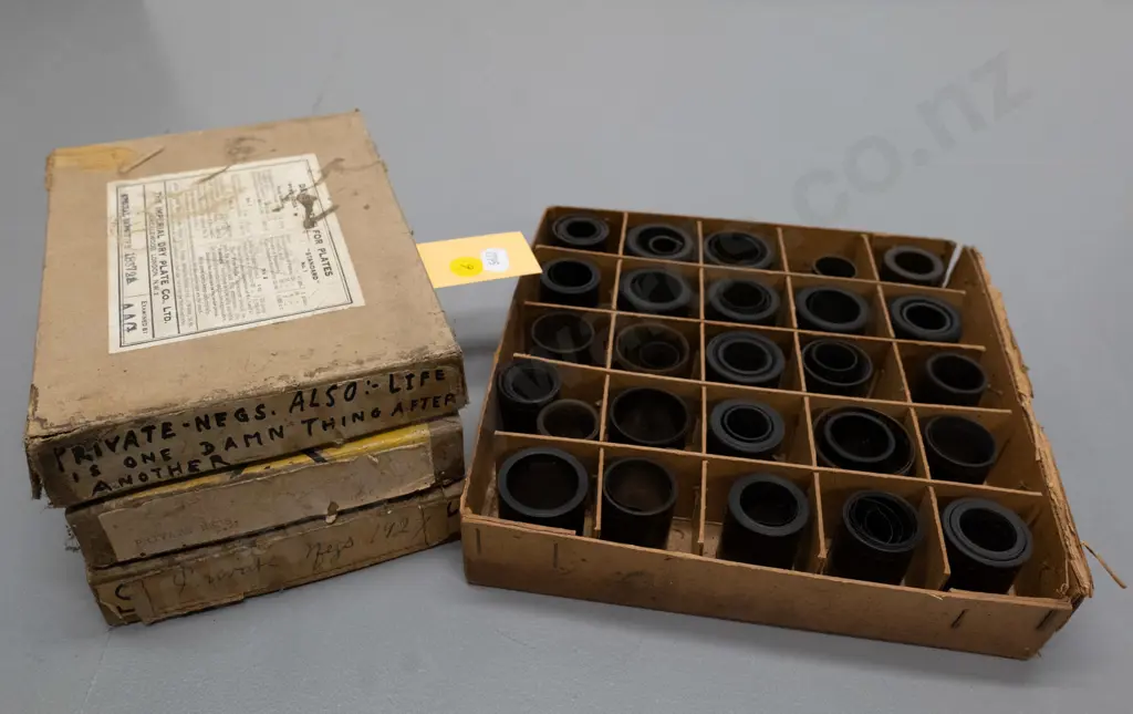 EA Philips? photography items - 3 boxes of glass plate negatives and box of 35mm rolls - misc. personal subjects Image 1++