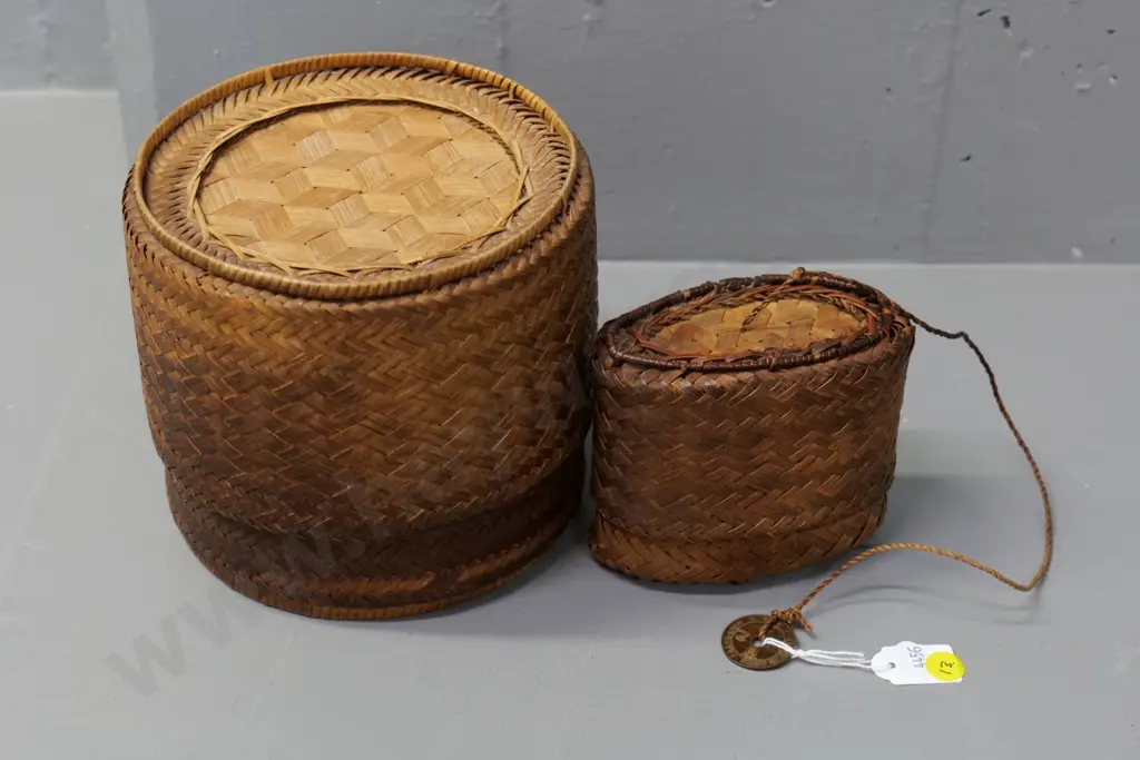 2 small woven cane baskets including small rice steamer with pierced French Indo-China coin on strap, larger H150 D160 Image 1++