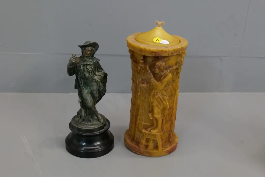 cast metal musketeer figure on wooden base H210 & a wax candle with fuel-burning candle fitting inside and wax lid H-230 Image 1++