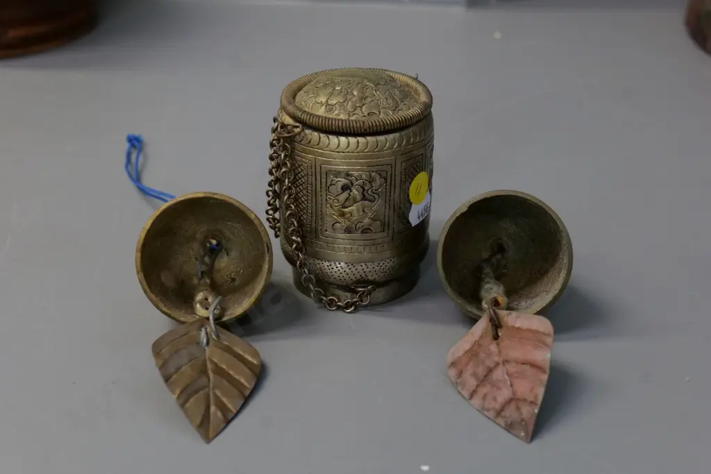 3 asian items - pair of brass bells and a repousse decorated betel nut container H-85 Image 1++