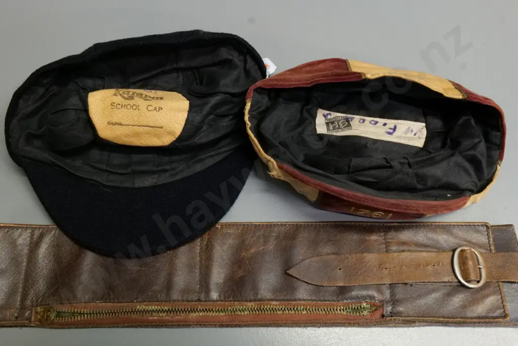 Oamaru 1921 Athletic Football Club cap, cricket cap with Kaiapoi stamp, and a vintage leather money belt Image 1++