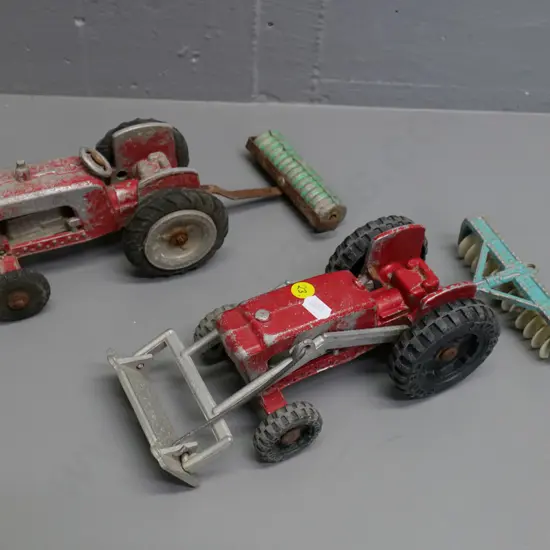 2 Fun Ho tractors and 2 sets of discs, one missing steering wheel, other missing blade & arm
