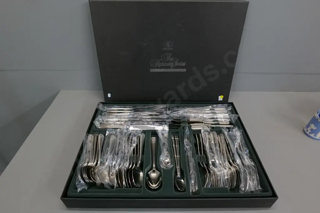 8-setting boxed set Strachan stainless cutlery plus some odd parfait spoons Image 1++