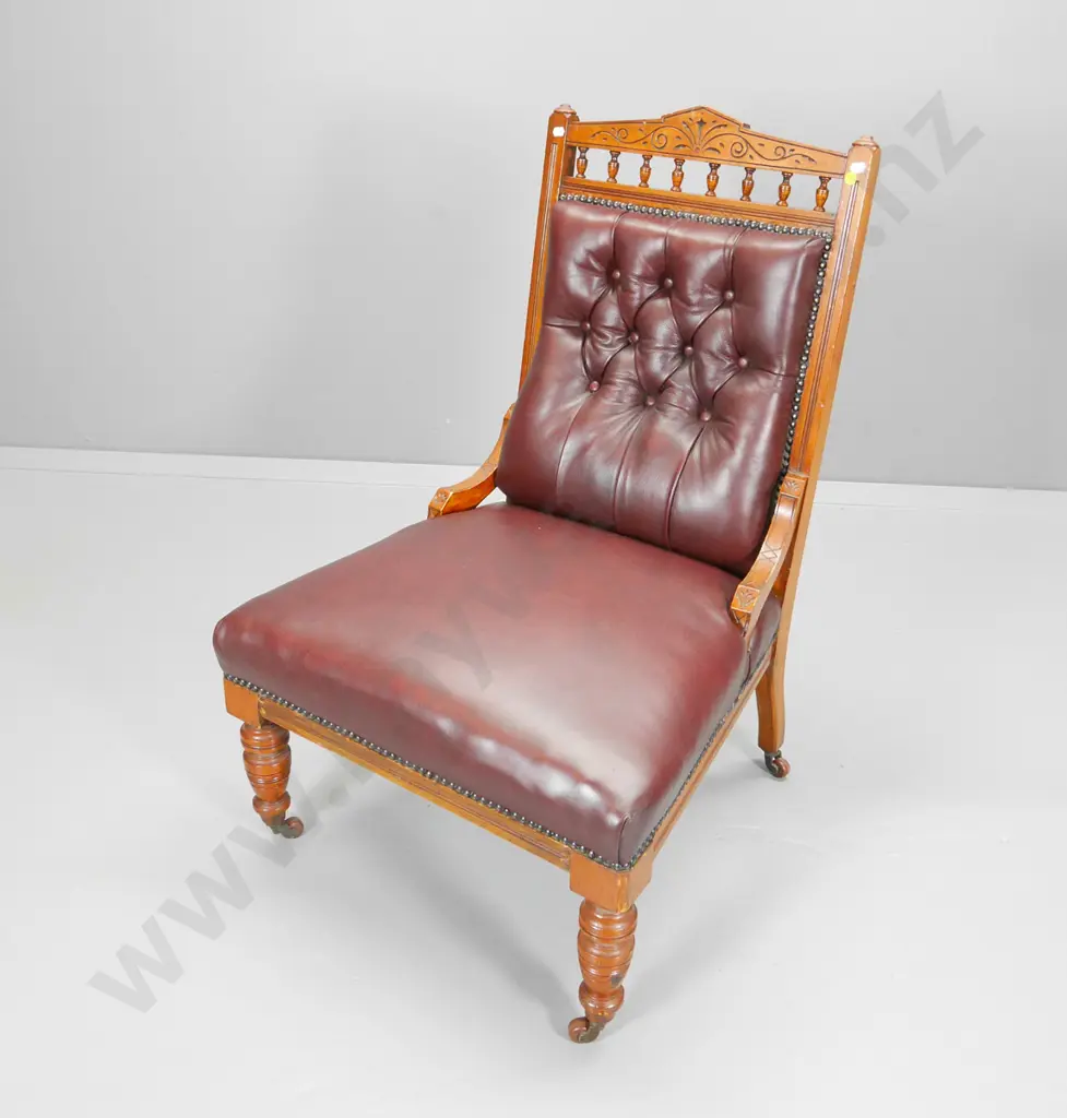 Edwardian lounge chair with carved wood frame, deep-button studded burgundy leather H-900 W-600 D-540 Image 1++