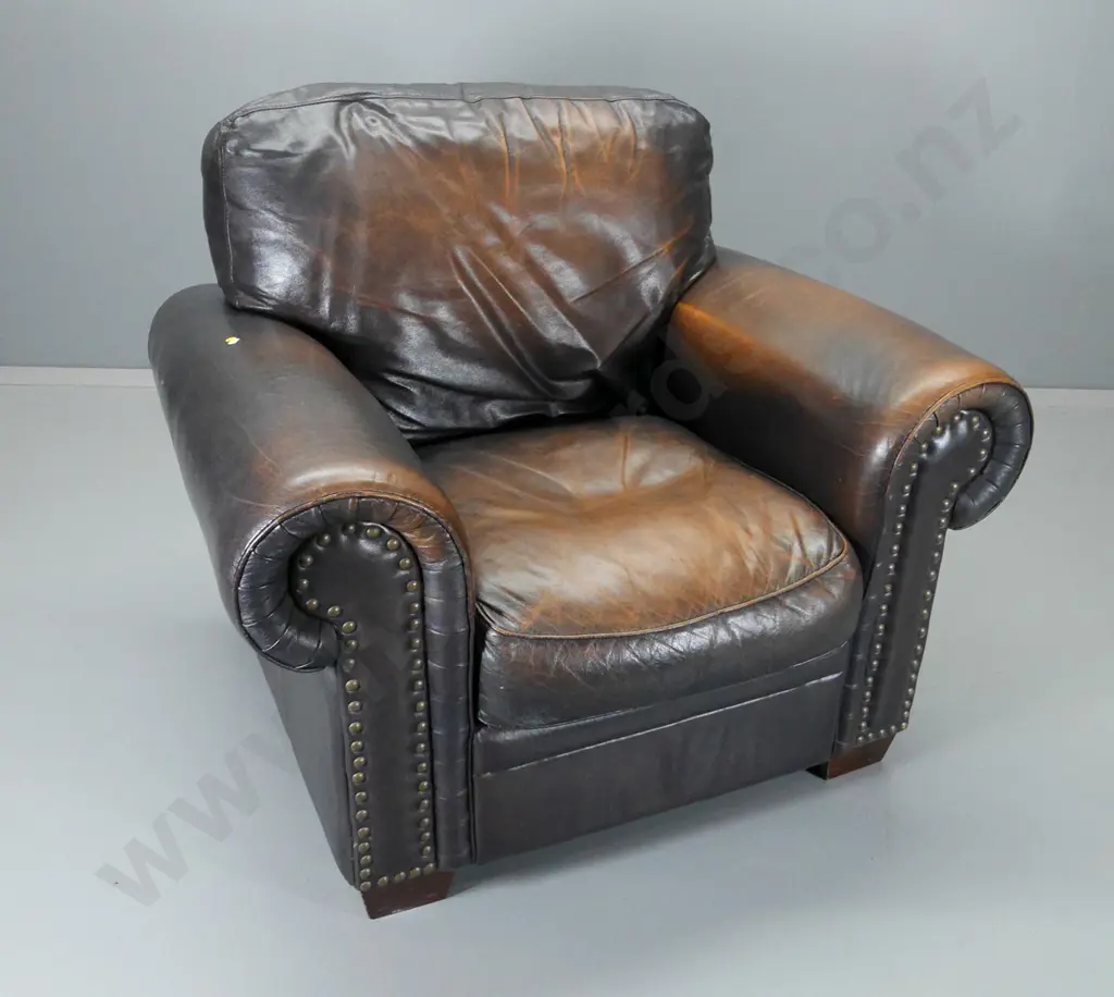 club style heavy studded rolled-arm leather chair with antiqued finish brown leather, some fading H-940 W-1060 D-950 Image 1++