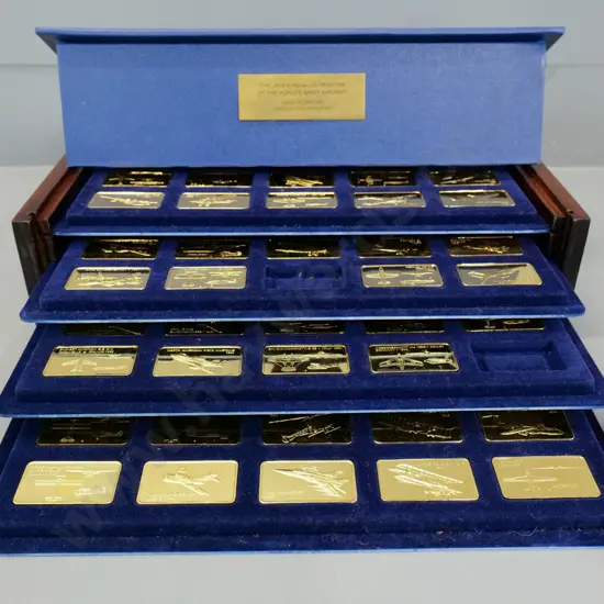 cased set of 'Janes Medallic Register' World's Great Aircraft gold-on-bronze ingots - two are missing