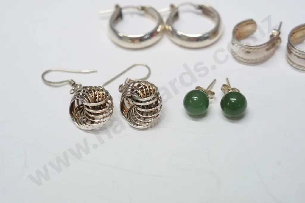 2 pairs of silver hoop earrings, pair silver drop earrings & pair of greenstone stud earrings Image 1++
