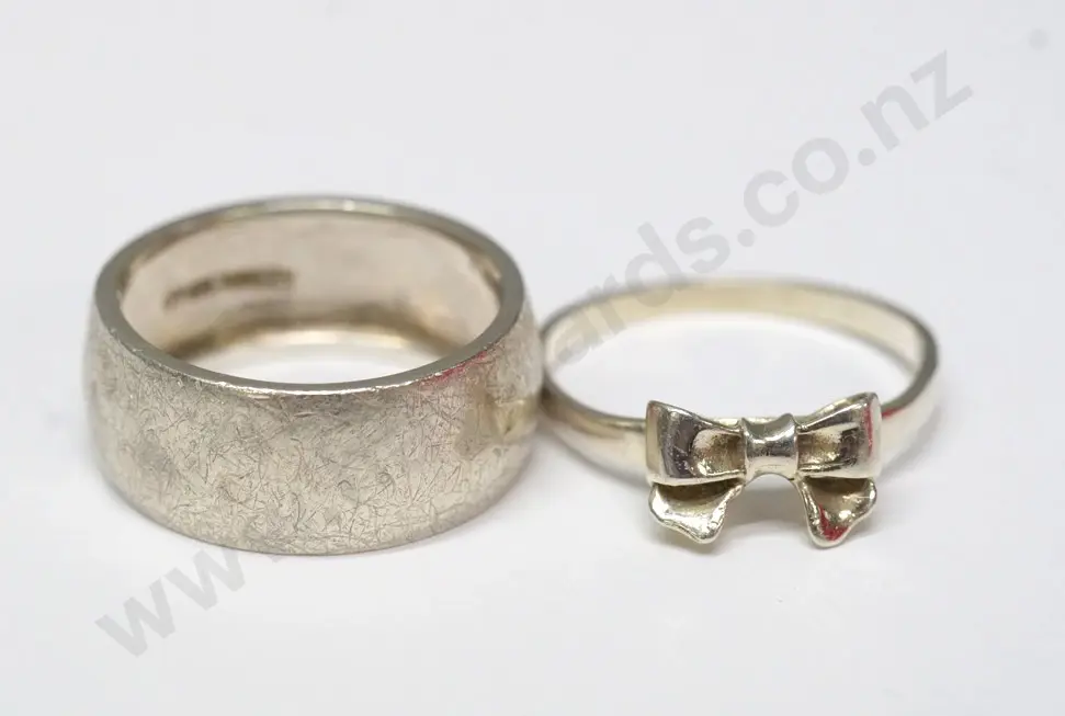 silver plain ring &  silver bow ring both stamped 925 Image 1++