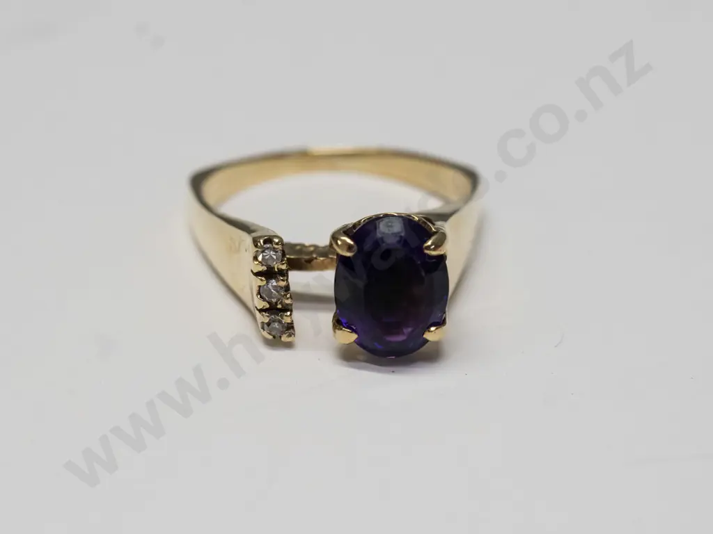 amethyst & cz dress ring stamped 9ct Image 1++
