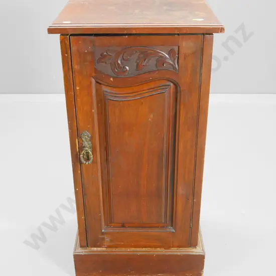 vintage mahogany pot cupboard with carved detail on door