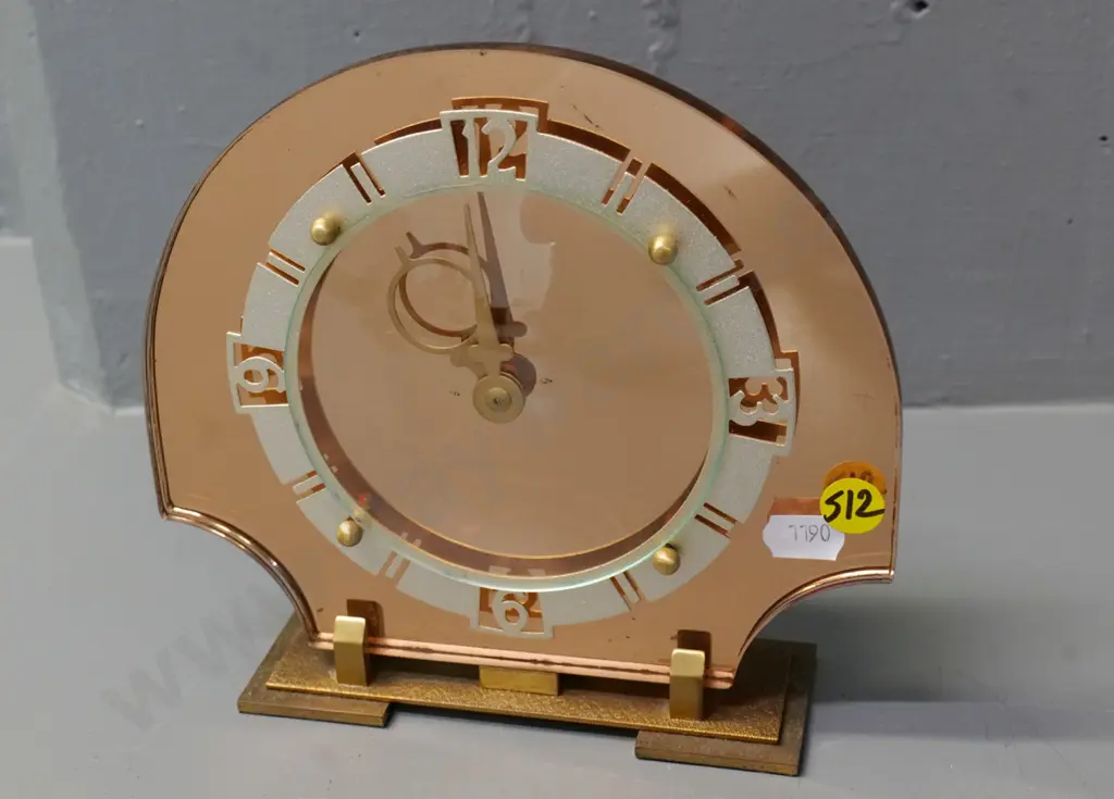 mantel clock with mirrored glass and metal face, marked Made in Britain H-170 W-180 Image 1++