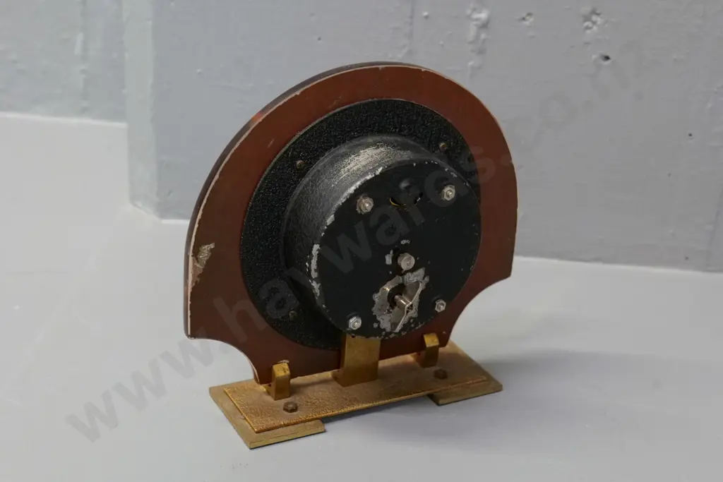 mantel clock with mirrored glass and metal face, marked Made in Britain H-170 W-180 Image 1++