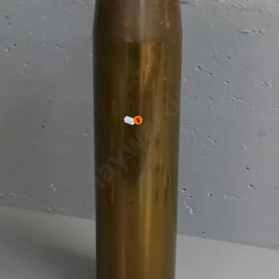 very large brass shell casing with hole drilled through base L-540