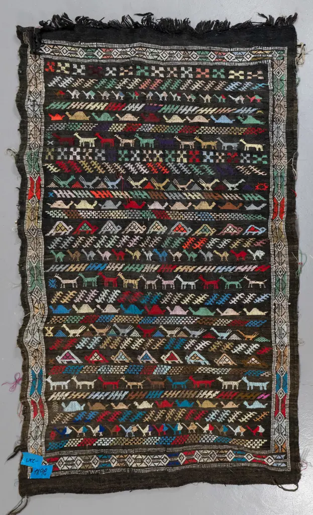 hand-knotted wool kilim floor rug - multi colour stylised animals, some fraying to sides L-1430 W-880 Image 1++